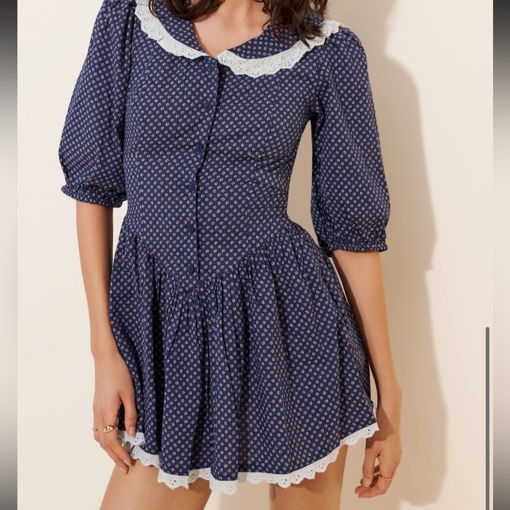 Free People “need to know” blue milkmaid mini dress